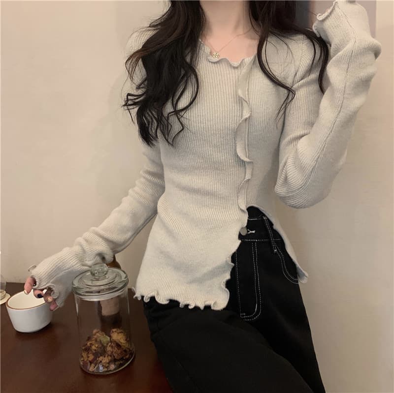 大人かわいい服 フリルエッジ不規則ニットプルオーバー
