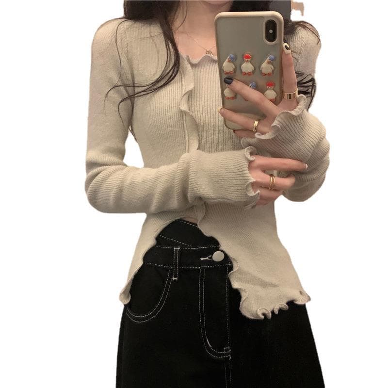 大人かわいい服 フリルエッジ不規則ニットプルオーバー