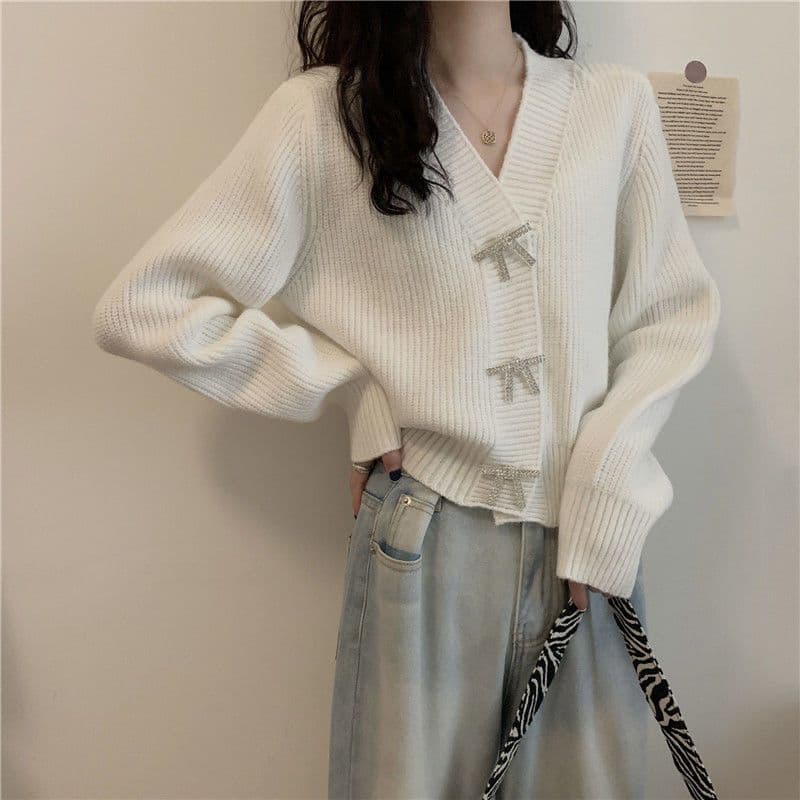 大人かわいい服 リボンモチーフ付きニットカーディガン