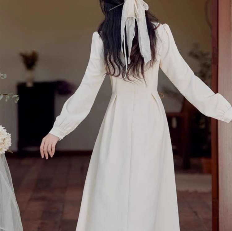 大人かわいい服 バイカラーデザイン袖付きラップドレス