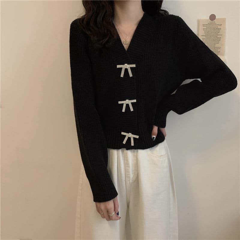 大人かわいい服 リボンモチーフ付きニットカーディガン