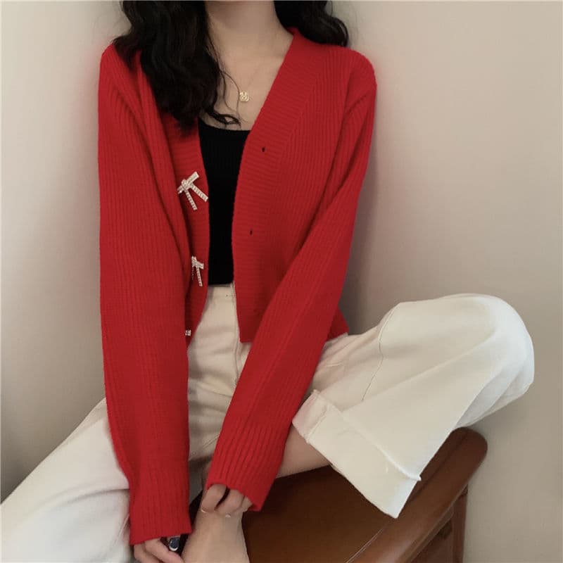 大人かわいい服 リボンモチーフ付きニットカーディガン